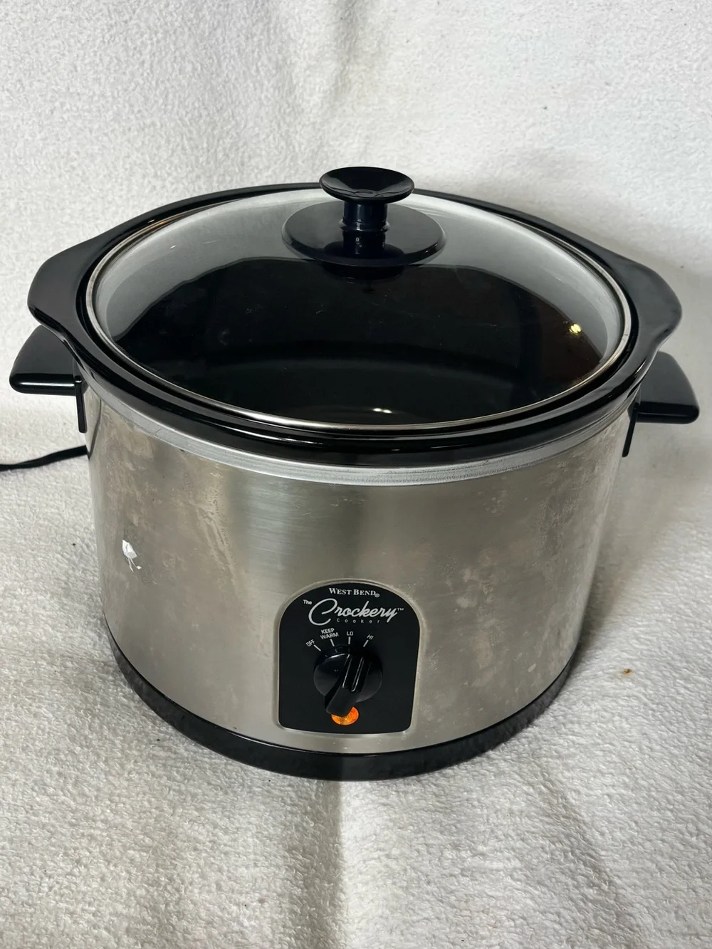West Bend Crockery Stainless Steel Slow Cooker in Black and Silver